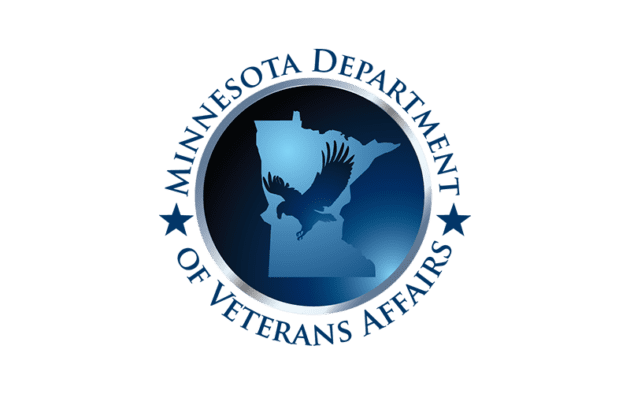 Logo depicting an eagle flying over Minnesota's outline, encircled by a metallic ring on a blue background.