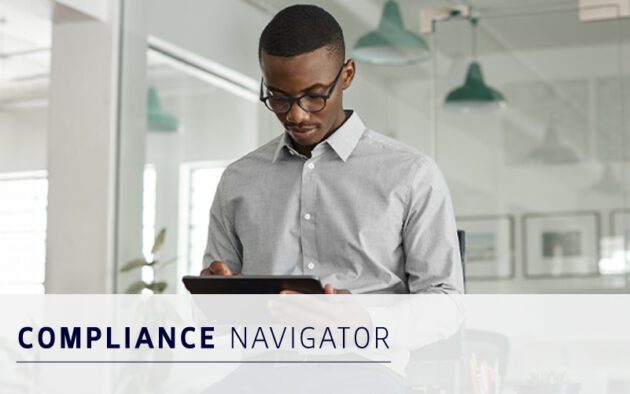 A man in a gray shirt and glasses uses a digital tablet in a modern office. Text reads "Compliance Navigator.