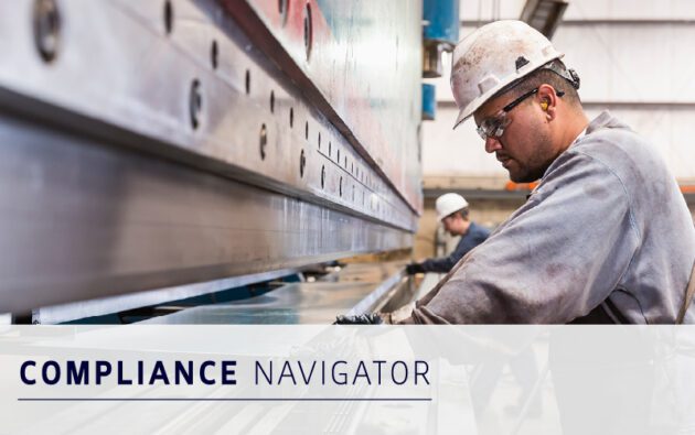 A worker in safety gear operates industrial machinery in a factory. The words "Compliance Navigator" are displayed at the bottom of the image.