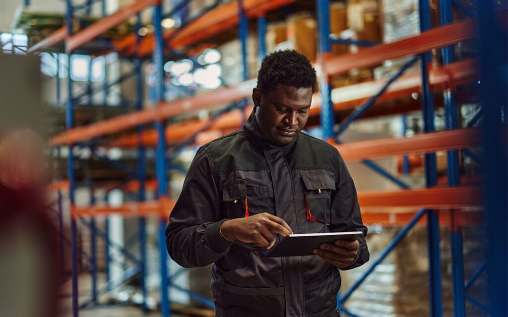 wearhouse employee looking at tablet