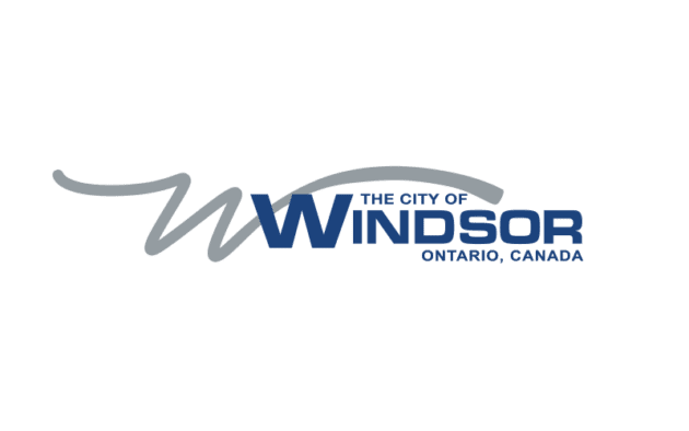 Logo of the City of Windsor, Ontario, Canada, featuring stylized gray wave lines above the text.