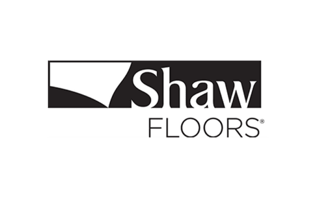 Logo of Shaw Floors featuring a stylized design and company name in bold black text on a white background.