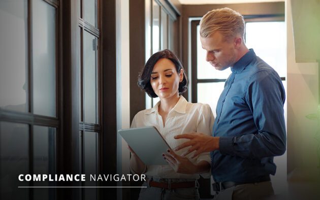 Man and woman discussing in an office, looking at a tablet. Text on image reads "Compliance Navigator.