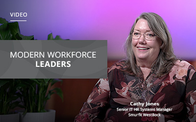 A woman with glasses sits in front of a purple and pink background. Text on the image reads "Modern Workforce Leaders" and "Cathy Jones, Senior IT HR Systems Manager, Smurfit WestRock.