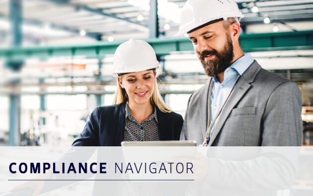 Two people wearing suits and white safety helmets stand indoors, looking at a tablet; text overlay reads "COMPLIANCE NAVIGATOR—powered by workforce management solutions.