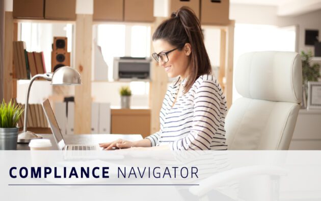 A woman in a striped shirt sits at a desk working on a laptop in an office, with the text "Compliance Navigator" overlaid at the bottom.