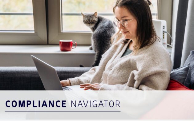 A person sits on a sofa working on a laptop with a cat and a red mug nearby. The text "Compliance Navigator" is overlaid at the bottom.